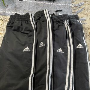 Adidas Black Sweatpants with Three-Stripe Design